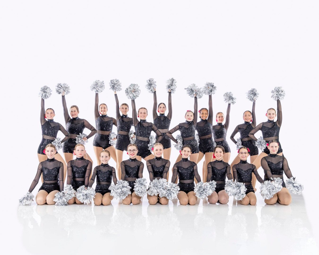 The Troupe performing with pom poms